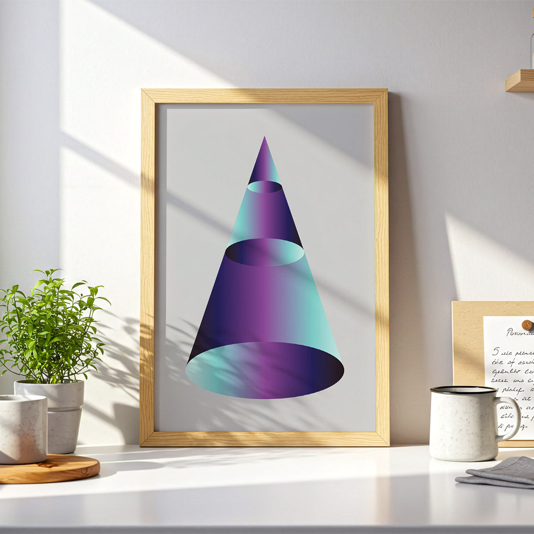 Framed abstract art print of a colorful geometric shape on a desk with decor items.