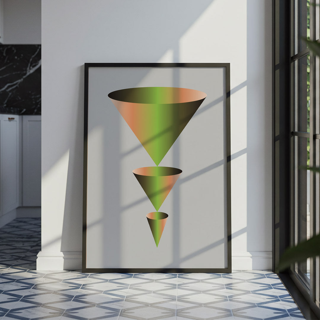 Framed abstract art of colorful geometric shapes on a wall.