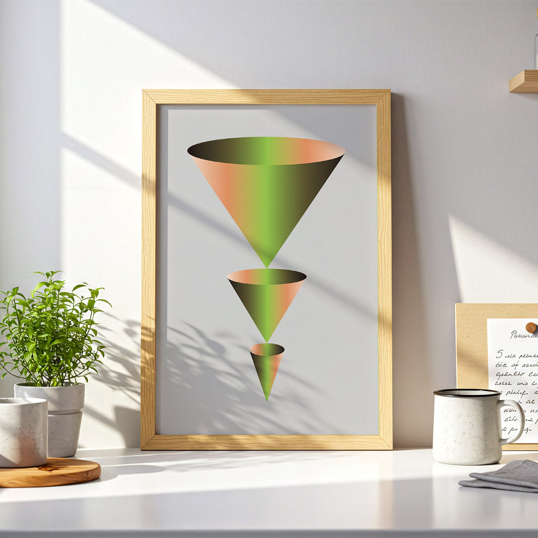 Framed geometric art print of a colorful triangle on a desk with decor items.