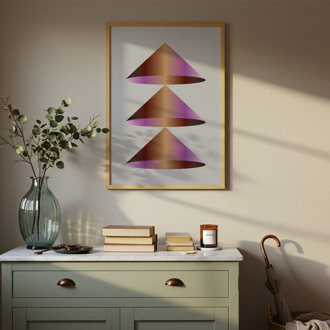 Abstract art piece on a wall above a dresser with decorative items.