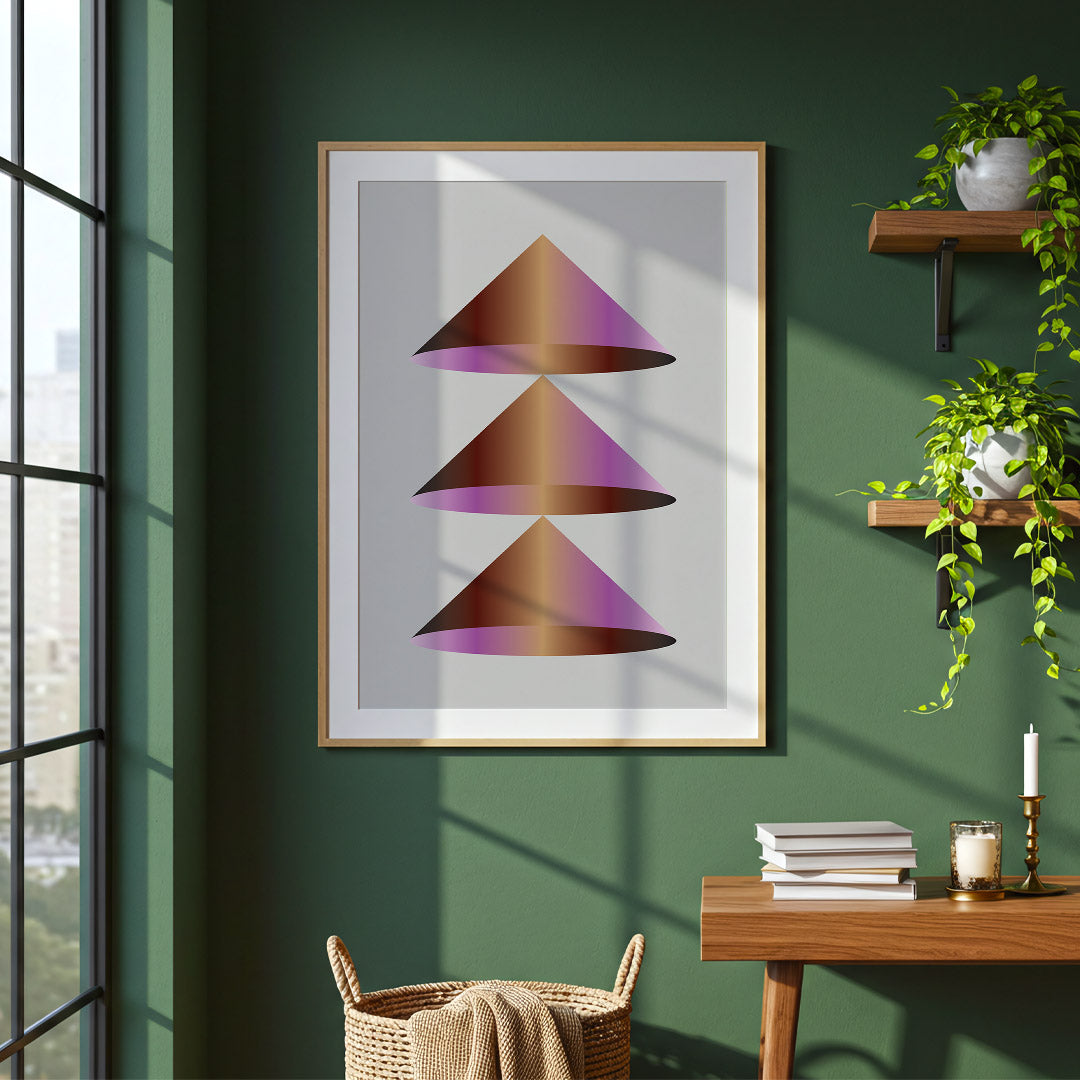 Framed abstract art piece on a green wall with a desk and window in the background