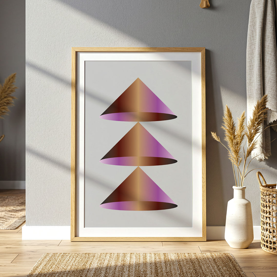 Framed abstract art print of geometric shapes in a modern interior setting.