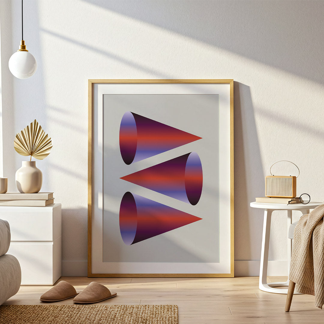 Abstract art print in a gold frame on a wall in a modern living room.