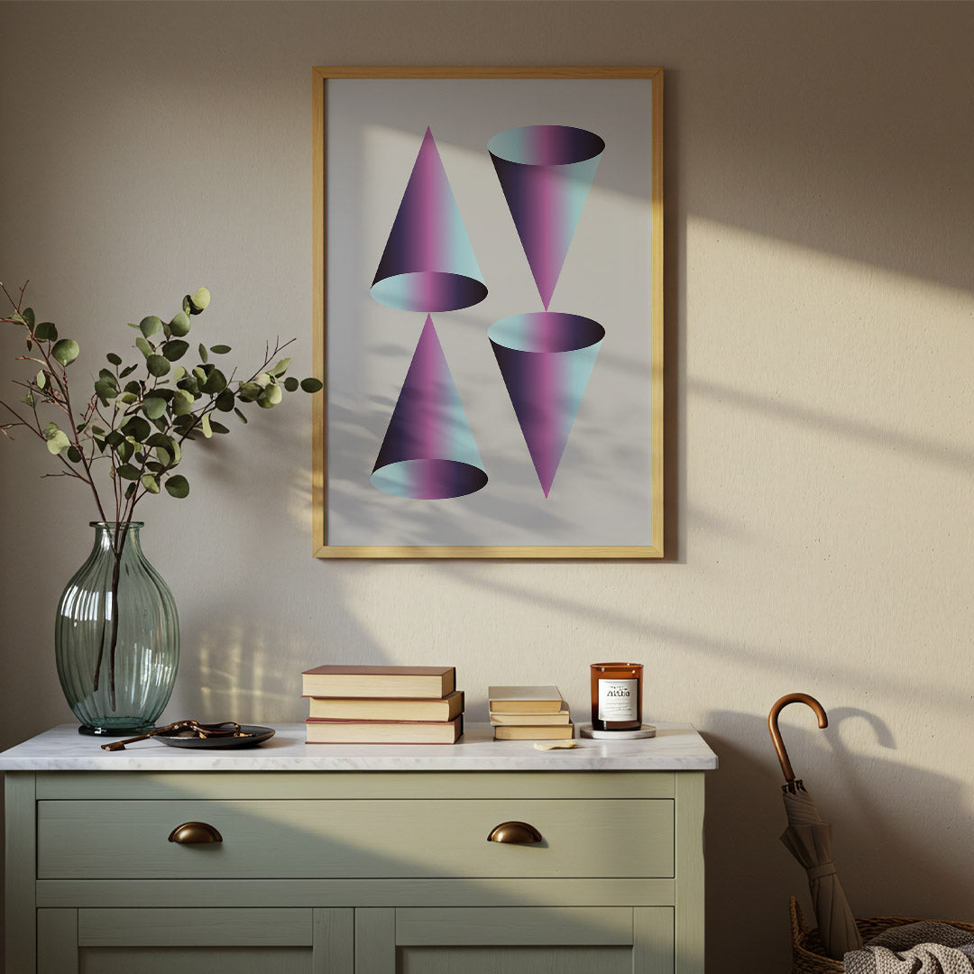 Framed abstract art on a wall above a dresser with decorative items.